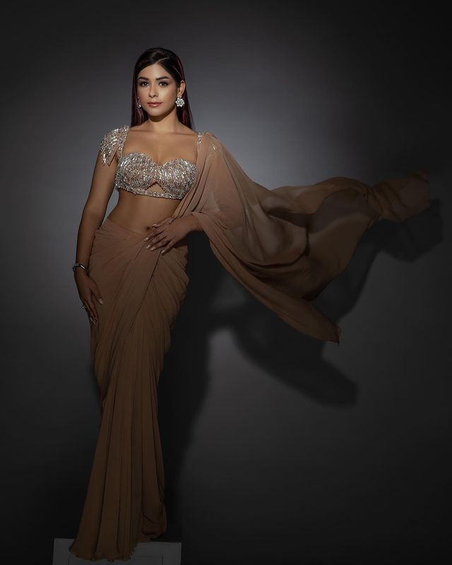 Divya Sharma in Nude Drape Saree With Bralette Blouse & Tasseled Sleeves